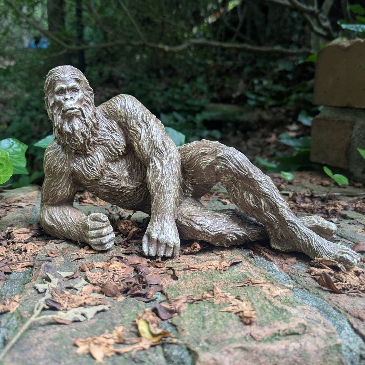 Lying Bigfoot Heart-throb Sasquatch Statue 10 inch Long: Natural