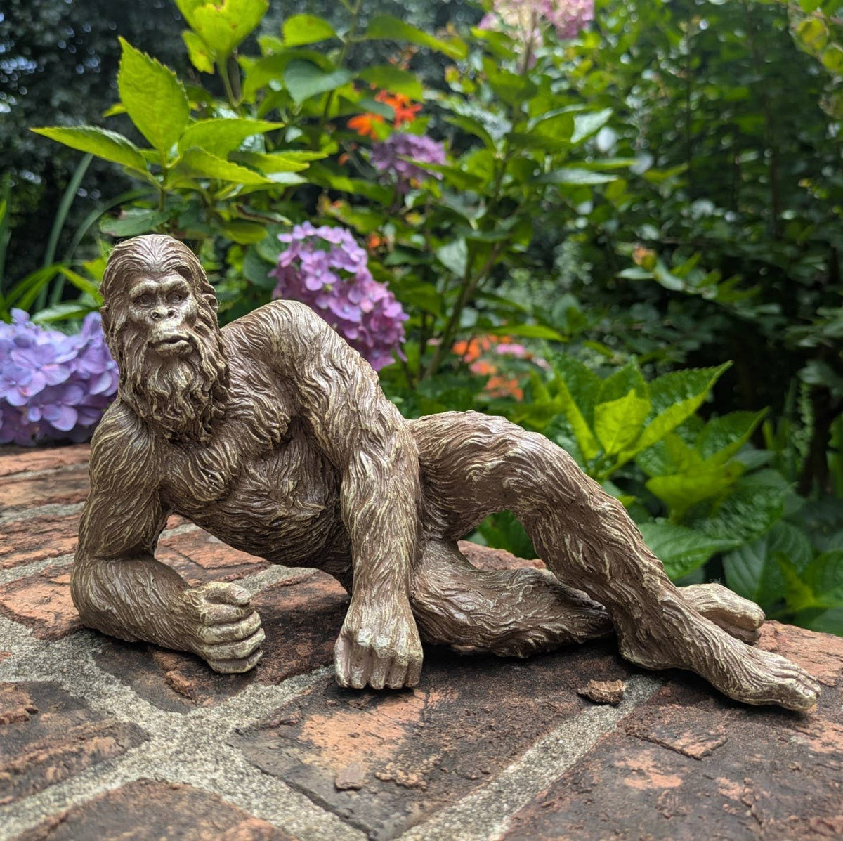 Lying Bigfoot Heart-throb Sasquatch Statue 10 inch Long: Natural